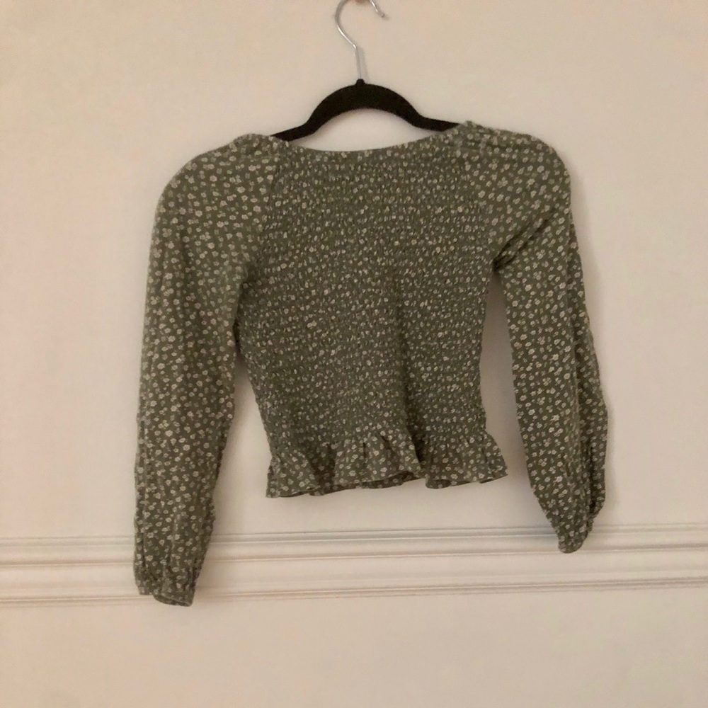 Green with white flowers top